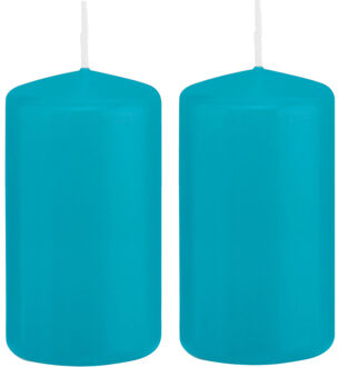 2x Kaarsen turquoise blauw 5 x 10 cm 23 branduren sfeerkaarsen - Stompkaarsen