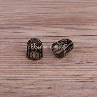 6 stks/partij 23*19mm brons kleur Metal hollow uniek stopper Connectors voor touw Sieraden Maken