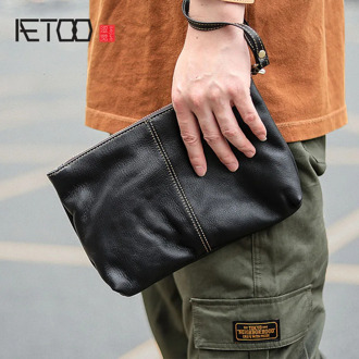 AETOO Men's 2019 trend simple leather handbag, men's soft leather business casual handbag, hand-caught bag