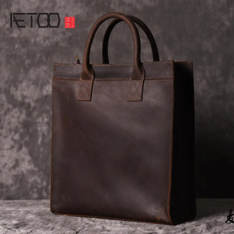 AETOO Men 's vertical handbag European and American shoulder Messenger bag business leather file package retro simple