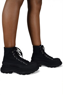 Alexander McQueen Sneakers Tread Slick Zwart - maat EU 39