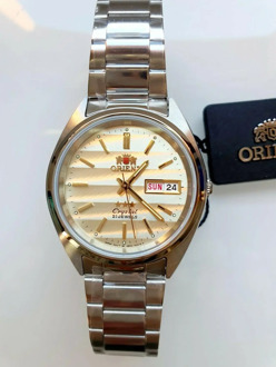 Automatic Man watch Orient Tristar FAB00007C beige gold automatic men's watch golden dial steel bracelet