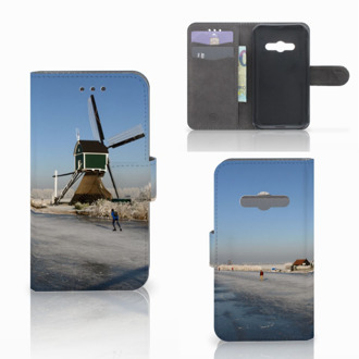 B2Ctelecom Telefoonhoesje Samsung Galaxy Xcover 3 | Xcover 3 VE Book Case Hoesje Design Schaatsers