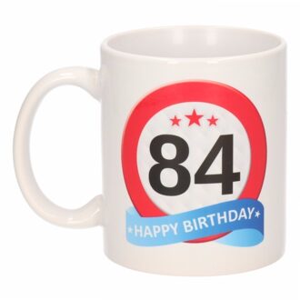 Bellatio Decorations 84 jaar Verjaardag koffiemok - cadeau beker - stopbord print - 300 ml - keramiek - wit