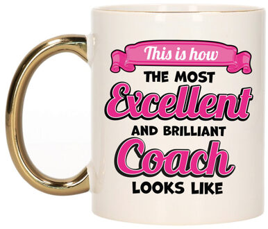 Bellatio Decorations Cadeau koffie/thee mok - excellent trainer/coach - goud/roze - keramiek - 300 ml Goudkleurig