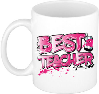 Bellatio Decorations Cadeau koffie/thee mok voor Meester/juf - roze - graffiti letters - de beste -?300 ml