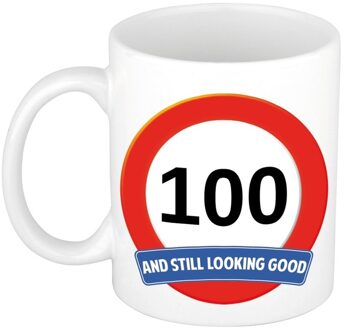 Bellatio Decorations Koffie mok / cadeau beker - 100 jaar - verjaardag - still looking good - wit - stopbord