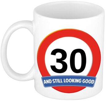 Bellatio Decorations Koffie mok / cadeau beker - 30 jaar - verjaardag - still looking good - wit - stopbord