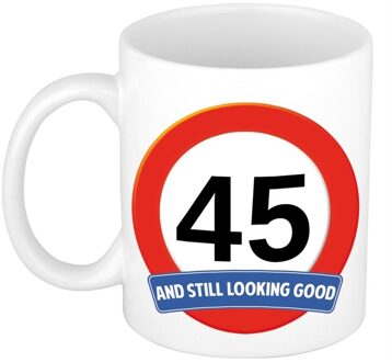 Bellatio Decorations Koffie mok / cadeau beker - 45 jaar - verjaardag - still looking good - wit - stopbord