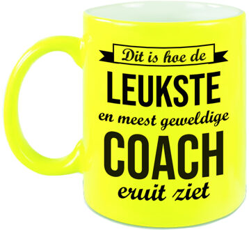 Bellatio Decorations Leukste en meest geweldige coach cadeau mok / beker neon geel 330 ml - cadeau trainer - feest mokken