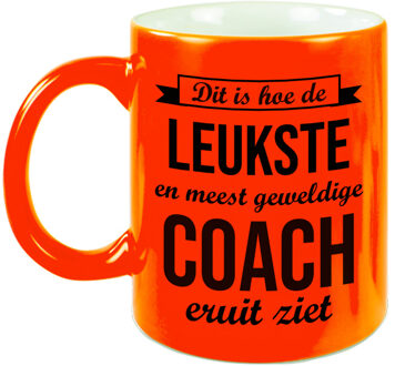 Bellatio Decorations Leukste en meest geweldige coach cadeau mok / beker neon oranje 330 ml - cadeau trainer - feest mokken