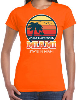 Bellatio Decorations Miami zomer t-shirt / shirt What happens in Miami stays in Miami voor dames - oranje - Miami party / vakantie outfit / kleding/ feest shirt XL