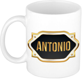 Bellatio Decorations Naam cadeau mok - heren - Antonio - gouden embleem - 300 ml - meester - bedankje Zwart