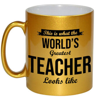 Bellatio Decorations Worlds Greatest Teacher cadeau mok / beker voor juf / meester goudglanzend 330 ml - feest mokken Goudkleurig