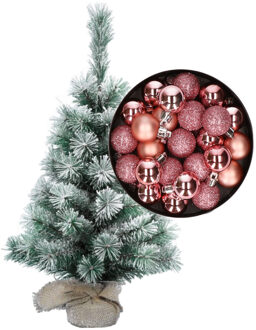 Besneeuwde mini kerstboom/kunst kerstboom 35 cm met kerstballen roze