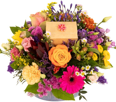 Bloemstuk bont + bonbons vanaf 25 cm