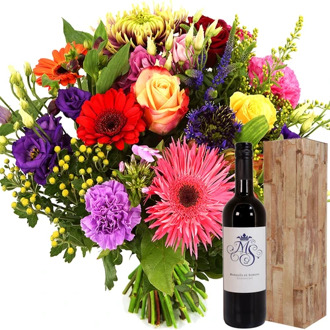 Bont boeket + fles rode wijn