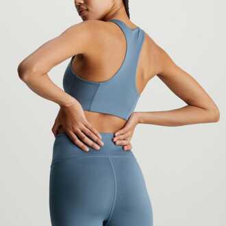 Calvin Klein Medium Impact Sportbeha in Blauw voor dames