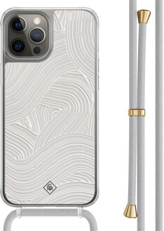 Casimoda iPhone 12 (Pro) hoesje met grijs koord - Abstract beige waves Bruin/beige