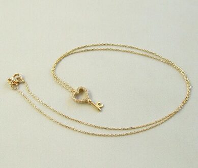 Christian Gouden collier en zirkonia harten sleutelhanger Geel Goud - One size