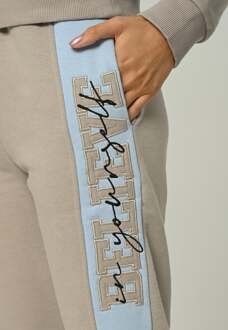 Dames trainingspak Believe met halve rits en applicatie Beige - XS