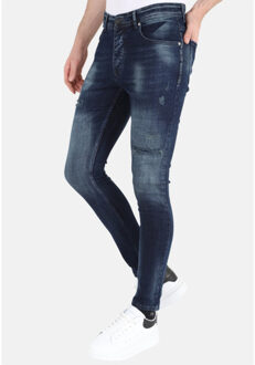 Donker stonewash jeans met gaten strech mm120 Blauw - 33