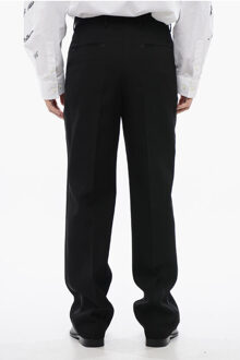 Dubbelgeplooide wollen broek met hoge taille in zwart