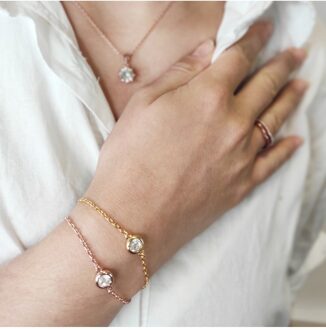 Dunne schakelarmbanden bezet met kristallen uit Oostenrijk Goud