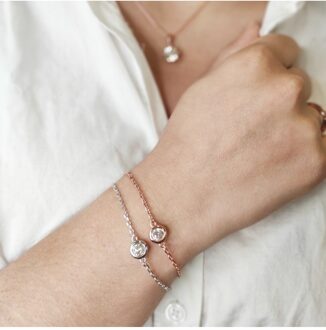 Dunne schakelarmbanden bezet met kristallen uit Oostenrijk Zilver en roségoud