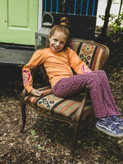 Fancy jersey top bright orange voor meisjes in de kleur - maat 104 Oranje