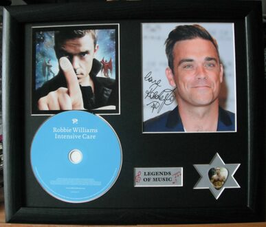 Foto met authentieke handtekening van Robbie Williams