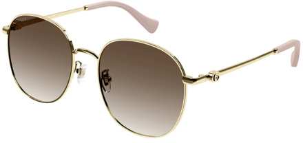 Gucci Goud/bruin getinte zonnebril Gucci , Yellow , Dames - 56 MM