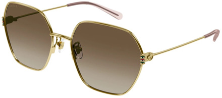 Gucci Goud/bruin getinte zonnebril Gucci , Yellow , Dames - 60 MM