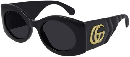 Gucci Zwarte ovale zonnebril met matelassé-tempel Gucci , Black , Dames - 52 MM