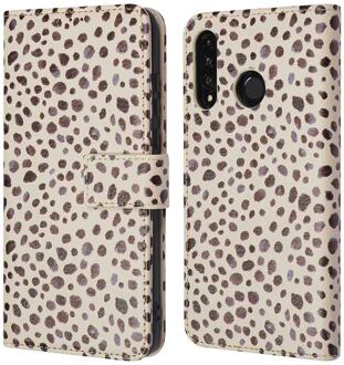 Imoshion Design Bookcase voor de Huawei P30 Lite - Black And White Dots Meerkleurig