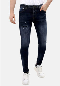Jeans slim fit stretch met scheuren mm Blauw - 38