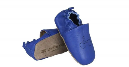 Leather baby shoes for your first steps with bicycle drawing