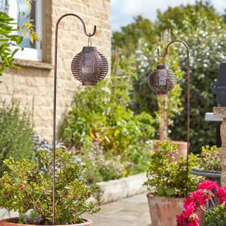LED-zonne-aardpen Forli, vlameffect, set van 2, 93 cm, IP44 brons