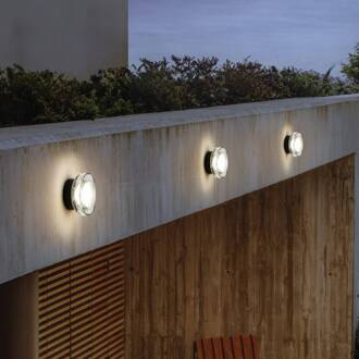 Marset LED buiten wandlamp Roc, Ø 17 cm, zwart/doorschijnend zwart, doorschijnend