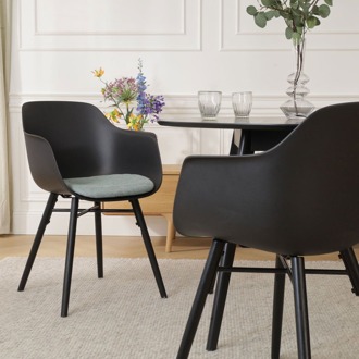 Nena-Liz eetkamerstoel zwart met zacht groen zitkussen - zwart houten onderstel