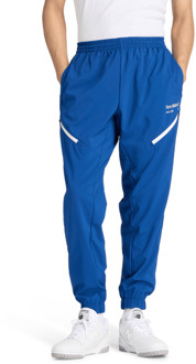 New Balance Reimagined Woven Jogger Broeken Heren - Blauw - Maat XL - Poly Jersey Blue