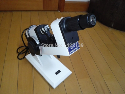 New NJC4 Optical Focimeter lensometer Manual lensmeter AC/DC powered External reading vertometer