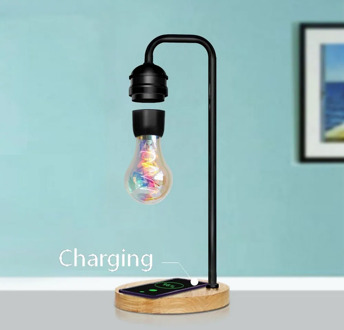 Novelty LED Magnetic Levitation Bulb Hover Floating Desk Lamp Magic Black Tech Wireless Charger for Phone Christmas Gift New