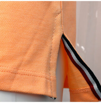Polo shirt willemstad abrikoos - maat S Oranje