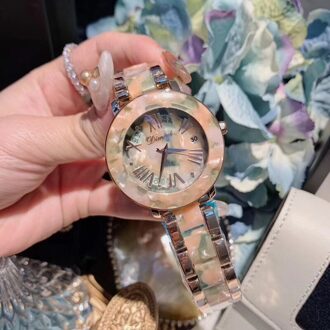 Populaire Diverse Bloemen Hars Armband Horloges voor Vrouwen Populaire Zomer Mode Horloge Quartz Waterdicht polshorloge Kalender oranje