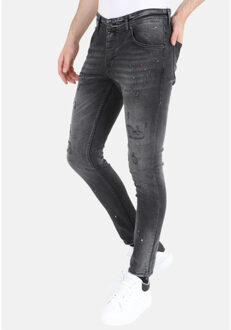 Ripped biker jeans met verfspatten slimfit Zwart - 30