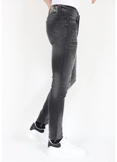 Ripped biker jeans met verfspatten slimfit Zwart - 38