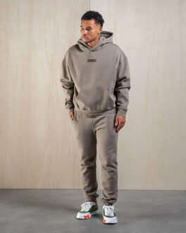 Rubber trainingspak - maat L Groen