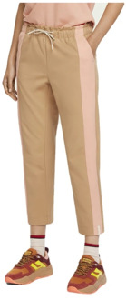 Scotch & Soda Club Nomade high waist tapered fit track pants met contrastbies Donkerbeige