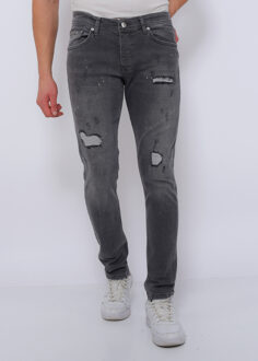 Slim fit jeans met scheuren dc Grijs - 31